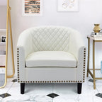 Poltrona a botte con borchie e gambe in legno massello - Ecopelle Nera